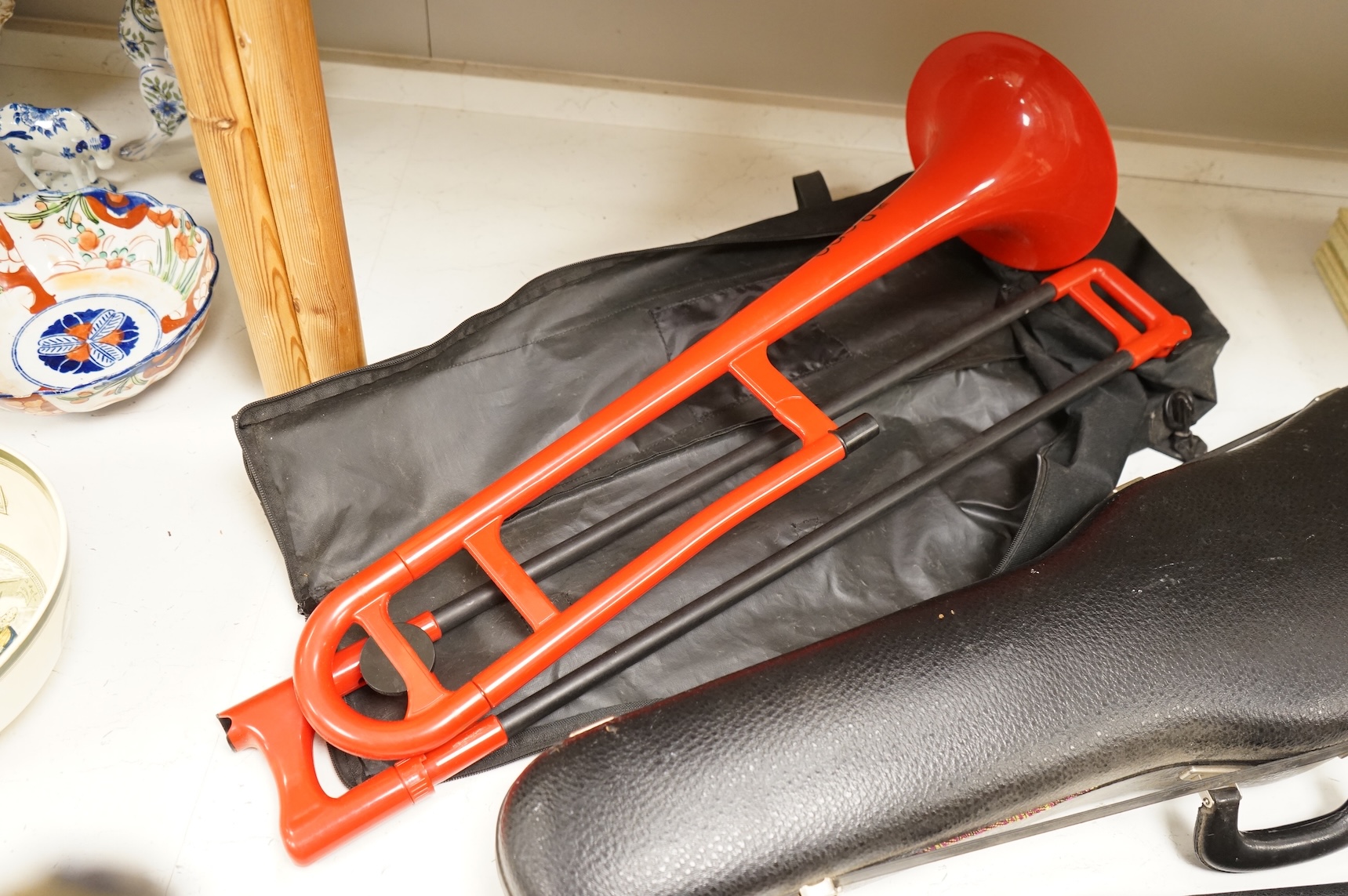 Three musical instruments to include a Buffet flute and violin with two bows